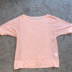 Pink, knitted New York & Company sweater.